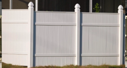 White vinyl privacy fence providing long-lasting residential security and curb appeal in Columbus, Ohio.
